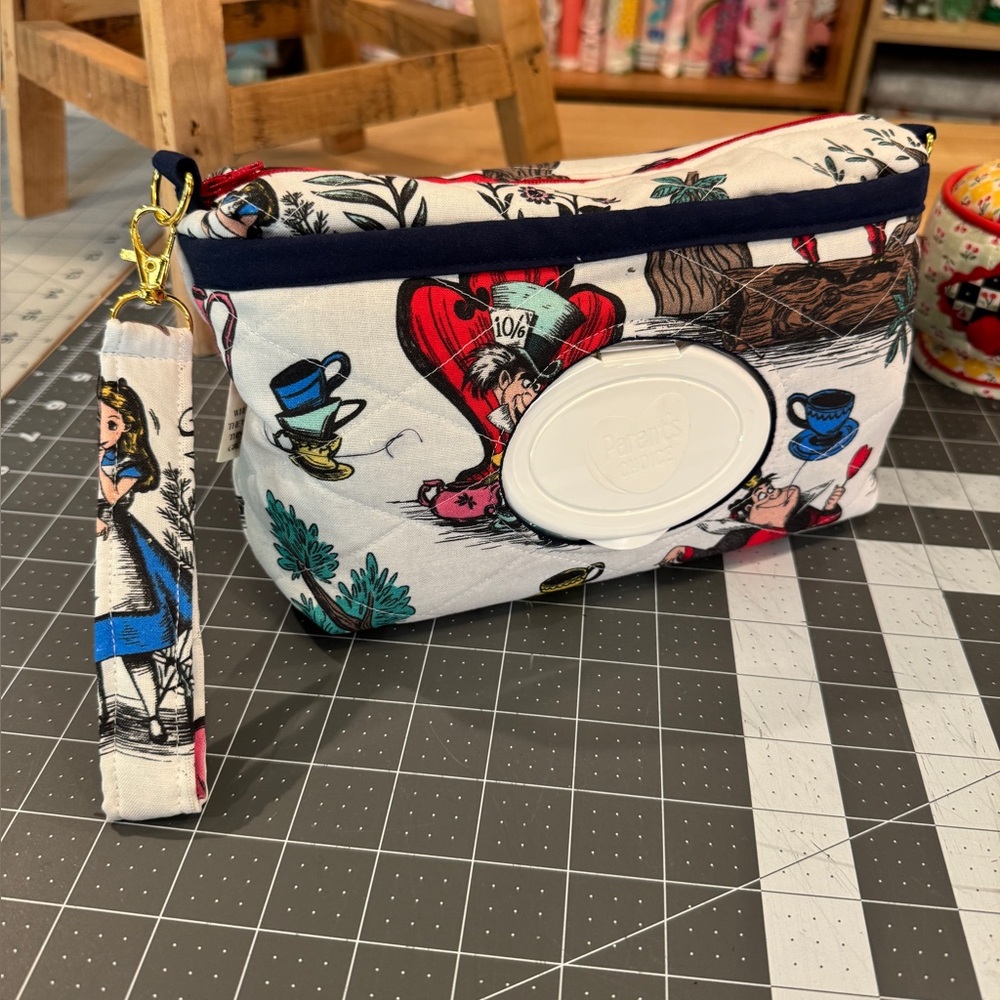 Diaper/wipe clutch bag Disney Alice in wonderland print